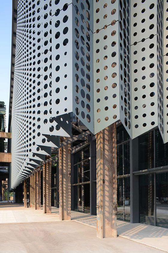 perforated metal facade designed by WallaceLiu in Chongqing Industrial Museum test panels on site